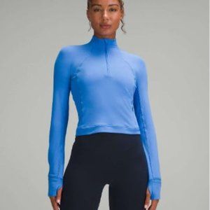 It's Rulu Run Cropped Half Zip in Pipe Dream Blue. Size 6